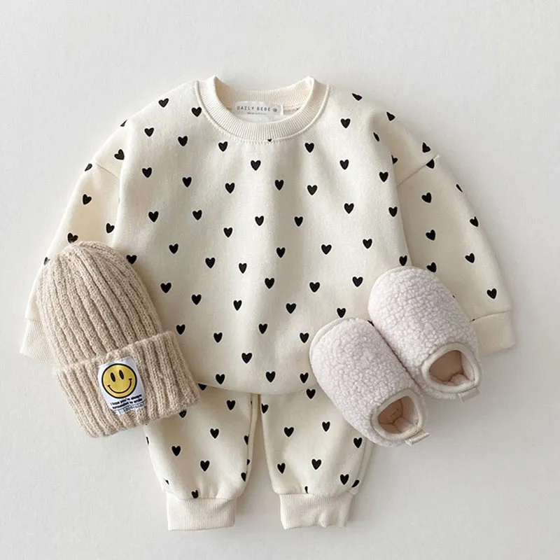 LYNN & CO | "Hartveroverende Babykledingset"