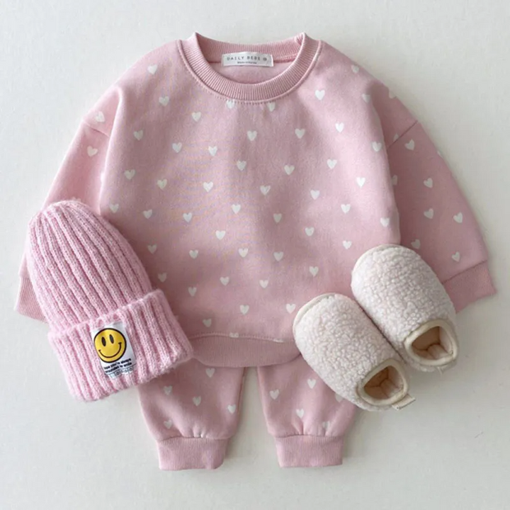 LYNN & CO | "Hartveroverende Babykledingset"