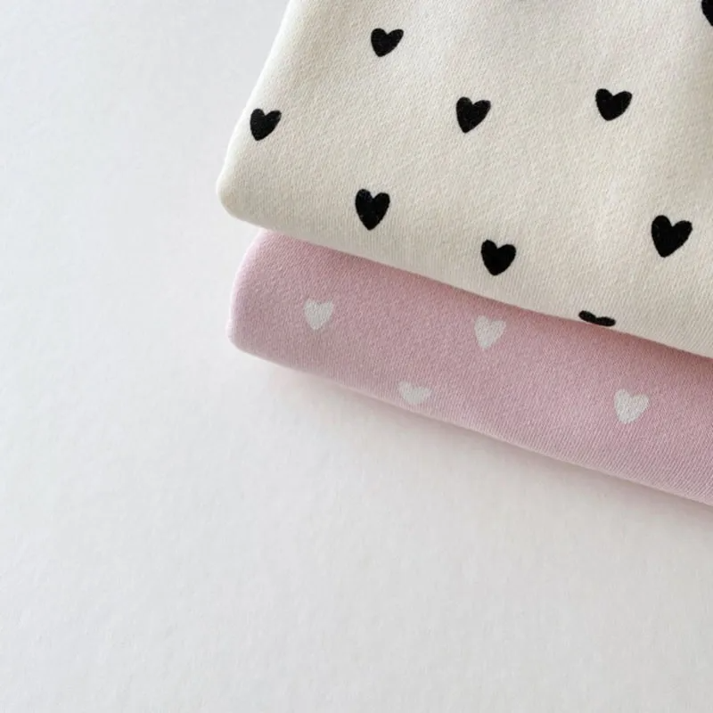 LYNN & CO | "Hartveroverende Babykledingset"