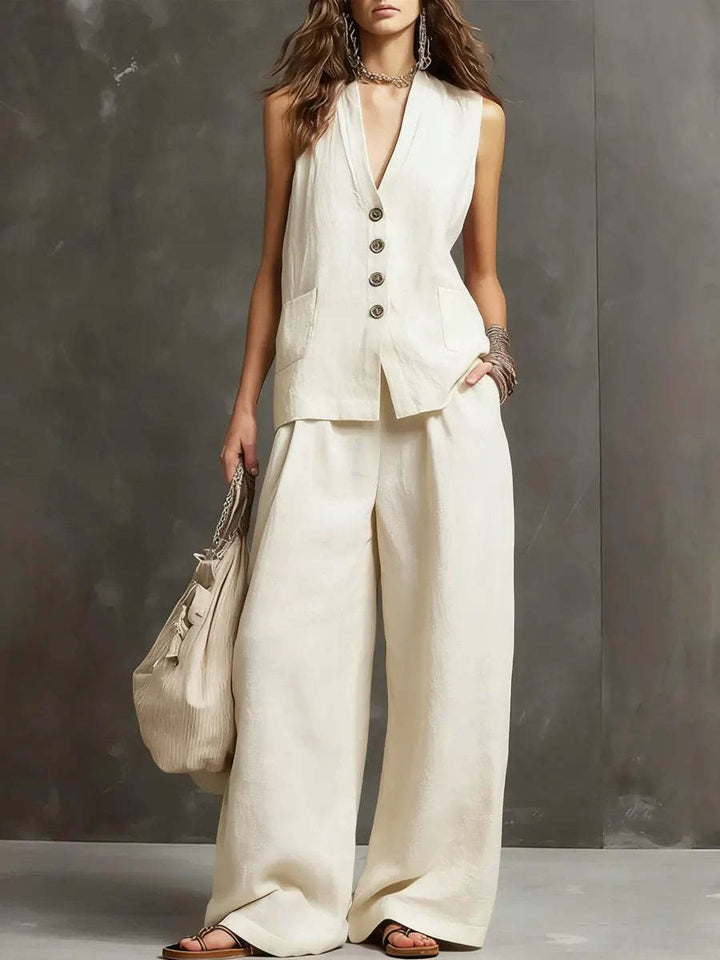 Two-piece set in cotton and linen with a sleeveless waistcoat and wide-leg trousers.